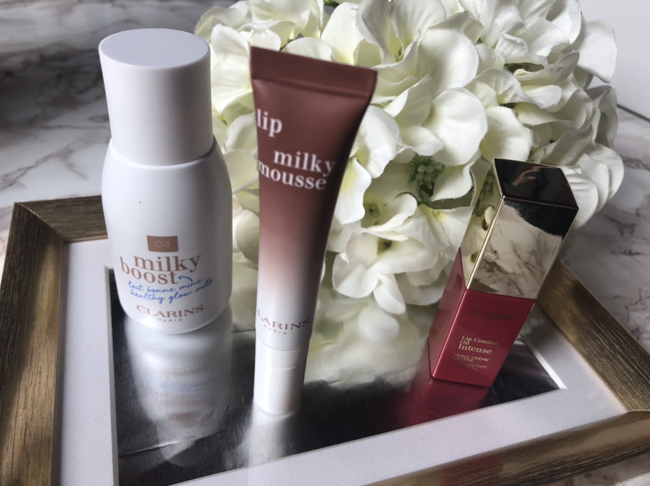 Clarins Makeup: milky boost, lip milky mousse e Lip Comfort Oil Intense